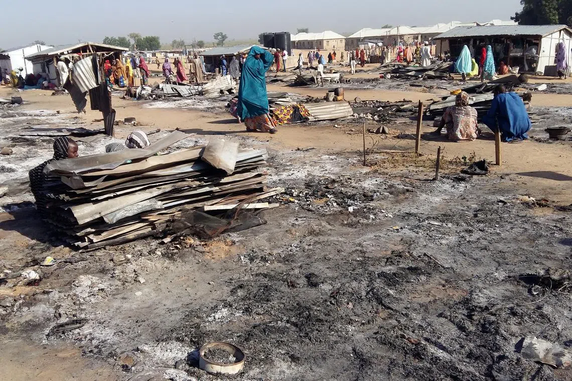 FILE PHOTO: A general view shows the damage at a camp for displaced people after an attack by suspected members of the Islamist Boko Haram insurgency in Dalori, in northeast Nigeria November 1, 2018. REUTERS/Kolawole Adewale/File Photo