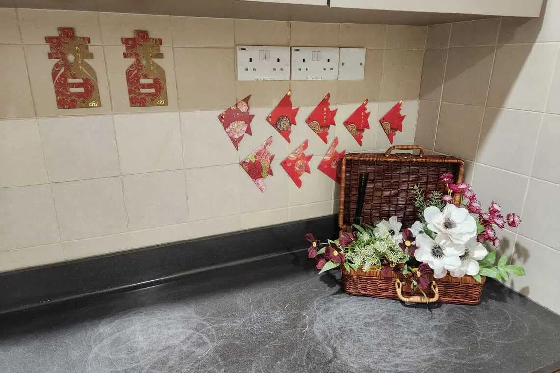 Spare red packets folded into origami by Ms Y. (Photo: Seshan Ramaswami) 
