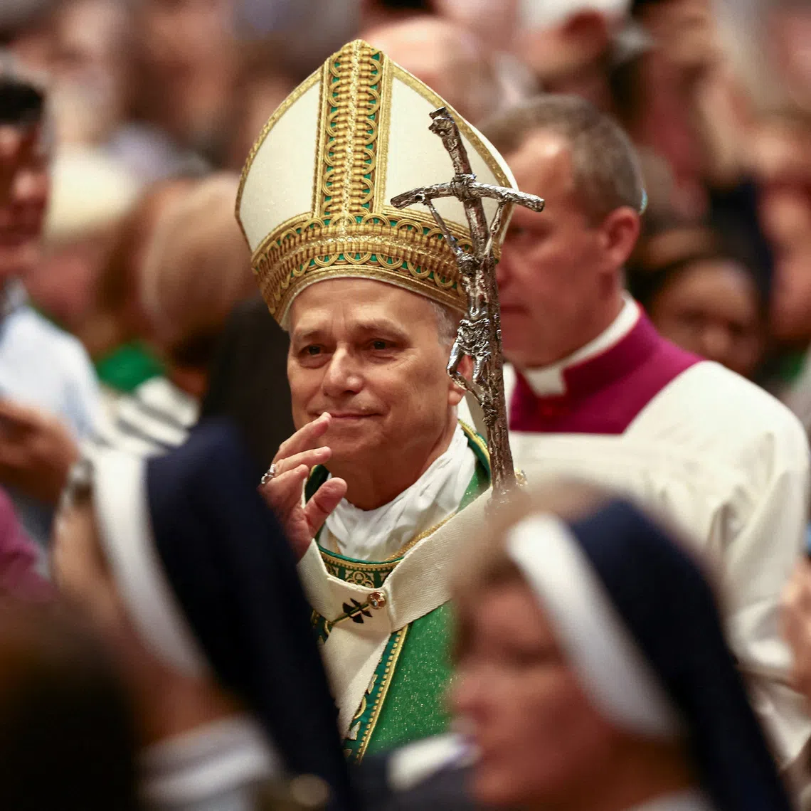 FILE PHOTO: Pope Leo XIV arrives to lead the Mass for the Jubilee of Synodal Teams and Participatory Bodies at St. Peter's Basilica in the Vatican, October 26, 2025. REUTERS/Yara Nardi/File Photo