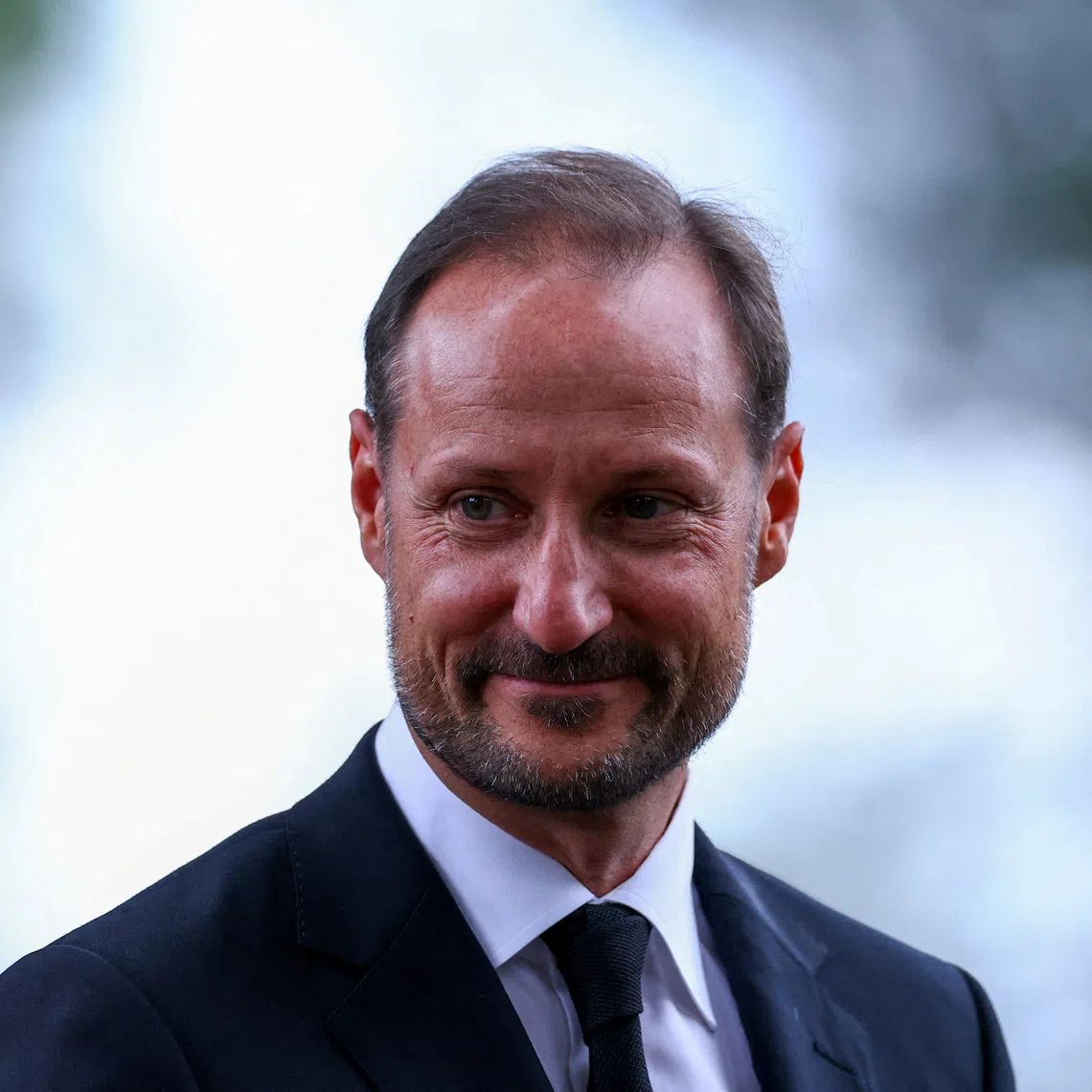 Norway's King Haakon looks on after attending a memorial service for the late King Harald, in Asker, Norway, August 30, 2026. REUTERS/Claudia Greco