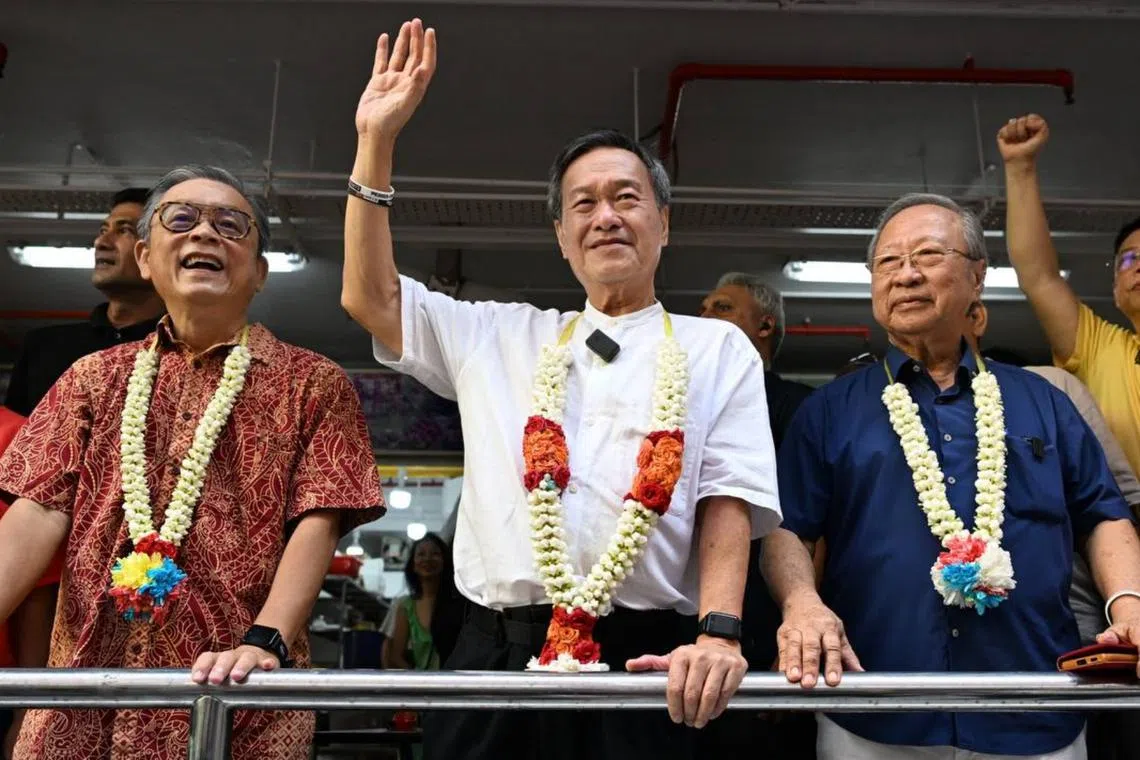 (From left) Mr Tan Jee Say, presidential candidate Tan Kin Lian and Dr Tan Cheng Bock at People’s Park Complex hawker centre on Aug 27, 2023.