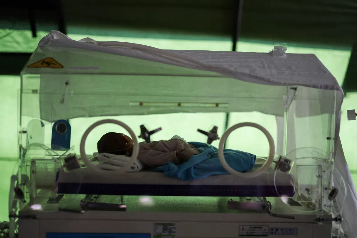 Gempita Soli Wona was born at just 1.3kg via caesarean section amid the aftershocks of the earthquake.