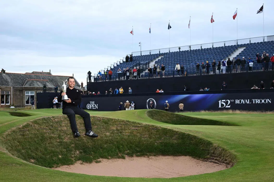 Xander Schauffele posing with the Claret Jug after winning the 152nd British Open Golf Championship at Royal Troon.