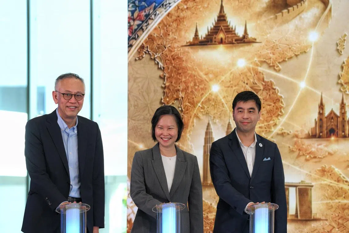 (From left) Lim Kok Kiang, Principal and CEO of Ngee Ann Polytechnic, Gan Siow Huang, Minister of State for Foreign Affairs and Trade and Industry, and Jason Bay, Chairperson of the SEA Advisory Panel, Ngee Ann Polytechnic, launch SEA Unbound at Ngee Ann Polytechnic Convention Centre.