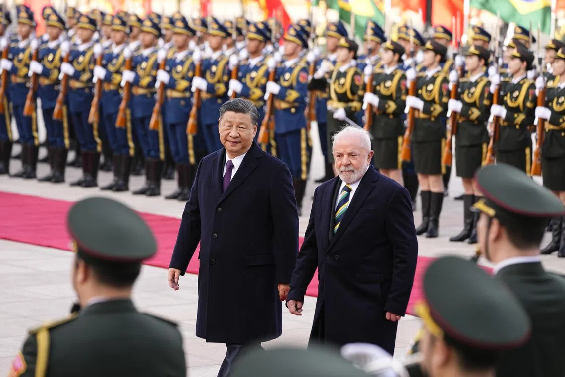 Brazilian President Luiz Inacio Lula da Silva (right) with Chinese President Xi Jinping during a welcome ceremony outside the Great Hall of the People in Beijing, China, on April 14.