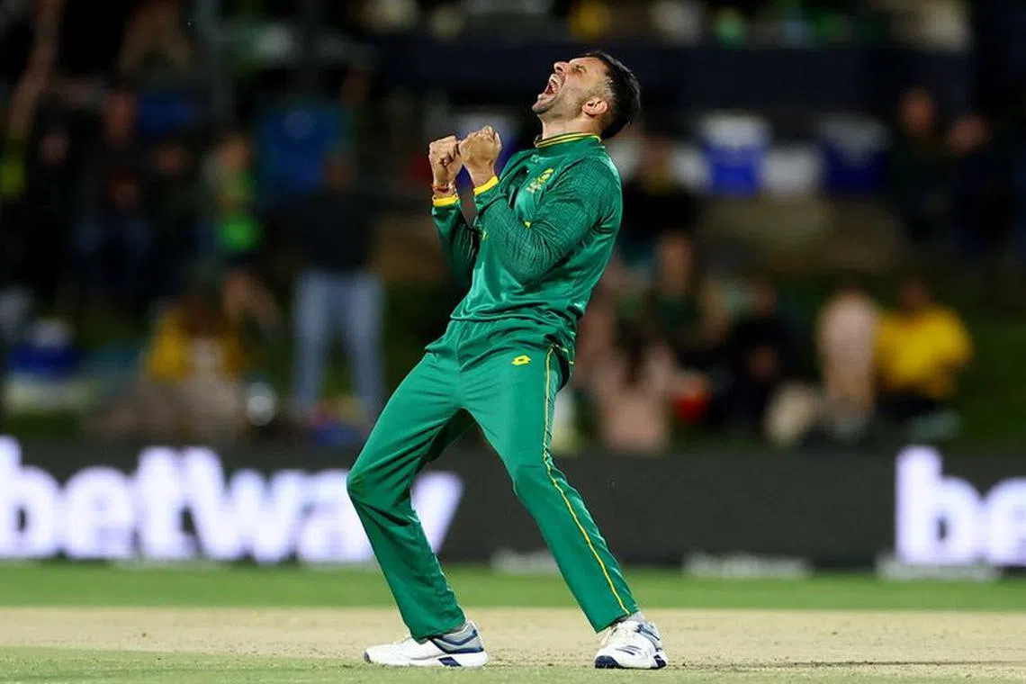 FILE PHOTO-Cricket - First ODI - South Africa vs Australia - Mangaung Oval, Bloemfontein, South Africa - September 7, 2023 South Africa's Keshav Maharaj celebrates after bowling out Australia's Sean Abbott REUTERS/Siphiwe Sibeko/File Photo