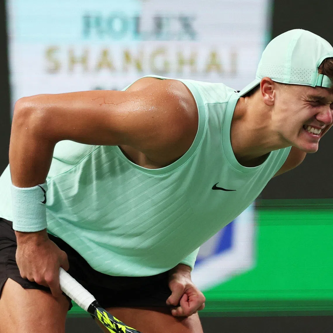 Tennis - ATP Masters 1000 - Shanghai Masters - Qizhong Forest Sports City Arena, Shanghai, China - October 9, 2025 Denmark's Holger Rune reacts after sustaining an injury during his quarter final match against Monaco's Valentin Vacherot REUTERS/Go Nakamura/File Photo