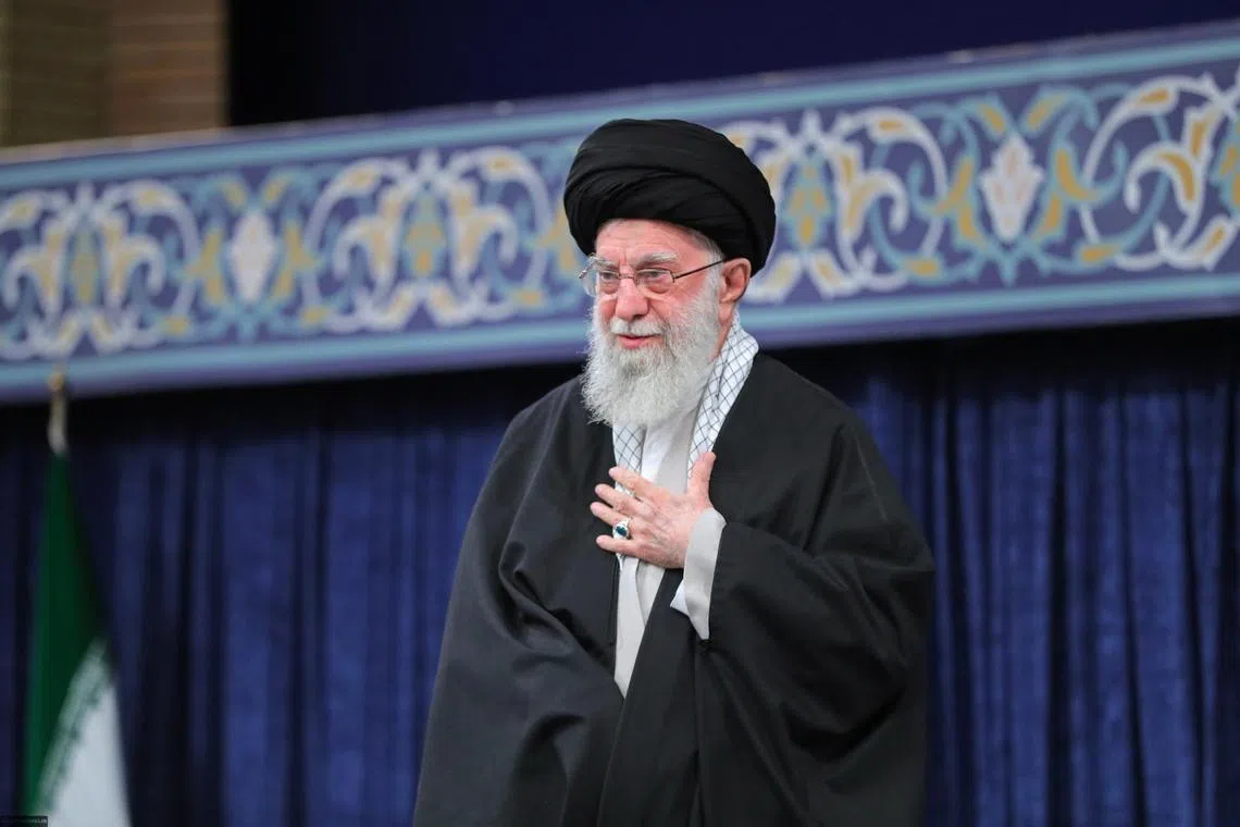 Iranian Supreme Leader Ayatollah Ali Khamenei greeting the crowd during a ceremony in Tehran, Iran, Oct 2, 2024. 