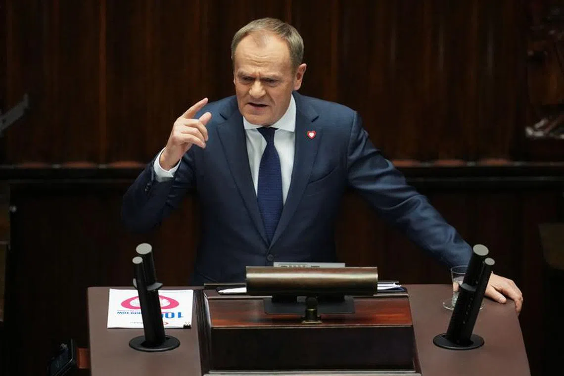 Newly appointed Polish Prime Minister Donald Tusk presents his government's programme and asks for a vote of confidence in Parliament in Warsaw, Poland December 12, 2023. REUTERS/Aleksandra Szmigiel/File Photo
