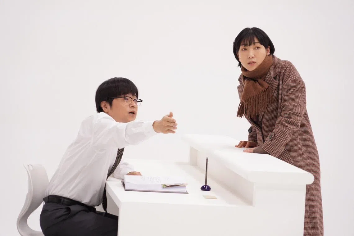 In the comedy Rebooting, an ordinary woman (Sakura Ando) meets a receptionist (Bakarhythm) in her afterlife.