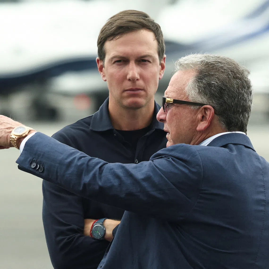 Mr Jared Kushner (left) speaking with US Special Envoy to the Middle East Steve Witkoffas in July.