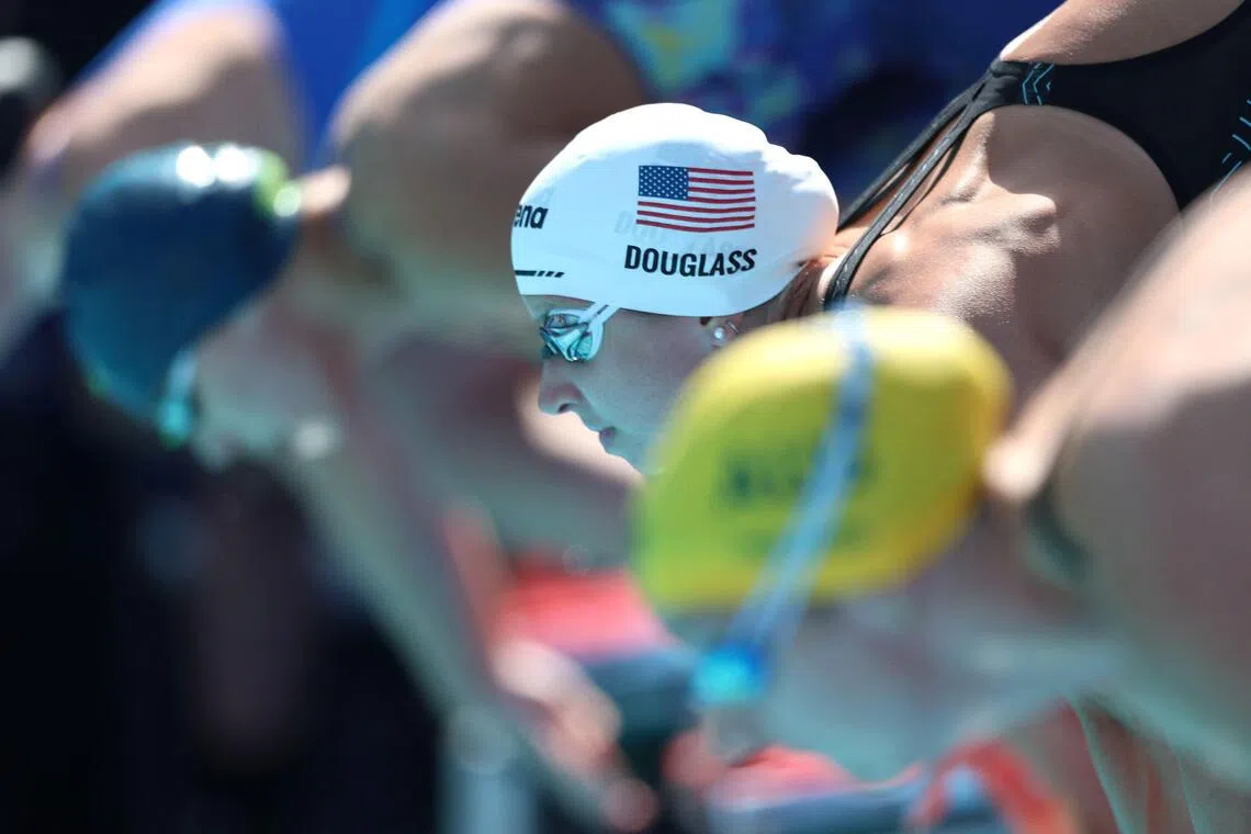 American Kate Douglass knocked three-tenths of a second off the world record of 23.49sec she set hours earlier in the heats to win the 50m freestyle in 23.19sec at the Pan Pacific Championships.