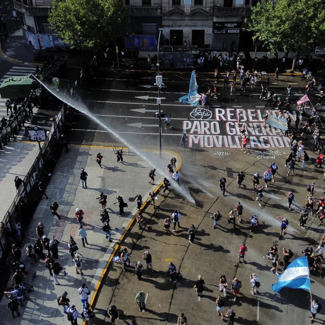 Demonstrators take part in a protest outside Argentina's National Congress on the day lawmakers discuss labor reforms proposed by President Javier Milei's libertarian government to attract investment and revive growth, which unions say would roll back workers' rights, in Buenos Aires, Argentina February 19, 2026. REUTERS/Alessia Maccioni