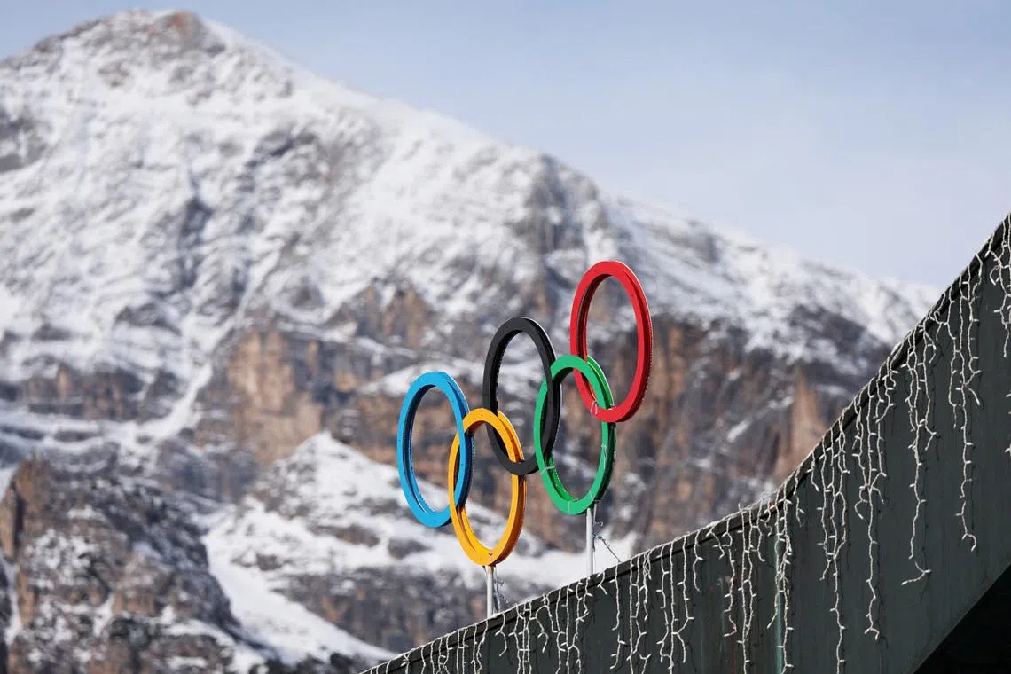 FILE PHOTO: A general view shows the Olympic rings on the Cortina Curling Olympic Stadium, which will host the curling, wheelchair curling, and Paralympic closing ceremony during the Milano Cortina Winter Olympic Games 2026, in Cortina, Italy, January 25, 2025. REUTERS/Claudia Greco/File Photo