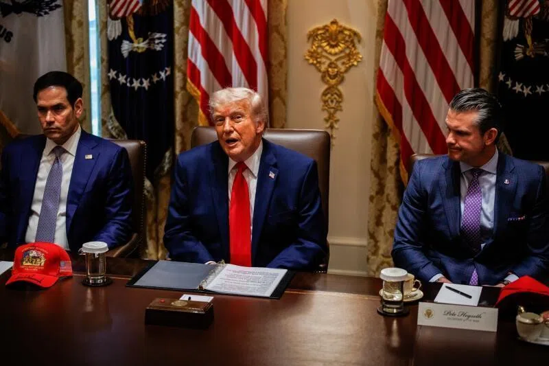 (From left) US Secretary of State Marco Rubio, US President Donald Trump and US Defense Secretary Pete Hegseth during a Cabinet meeting on May 27 at the White House in Washington DC.