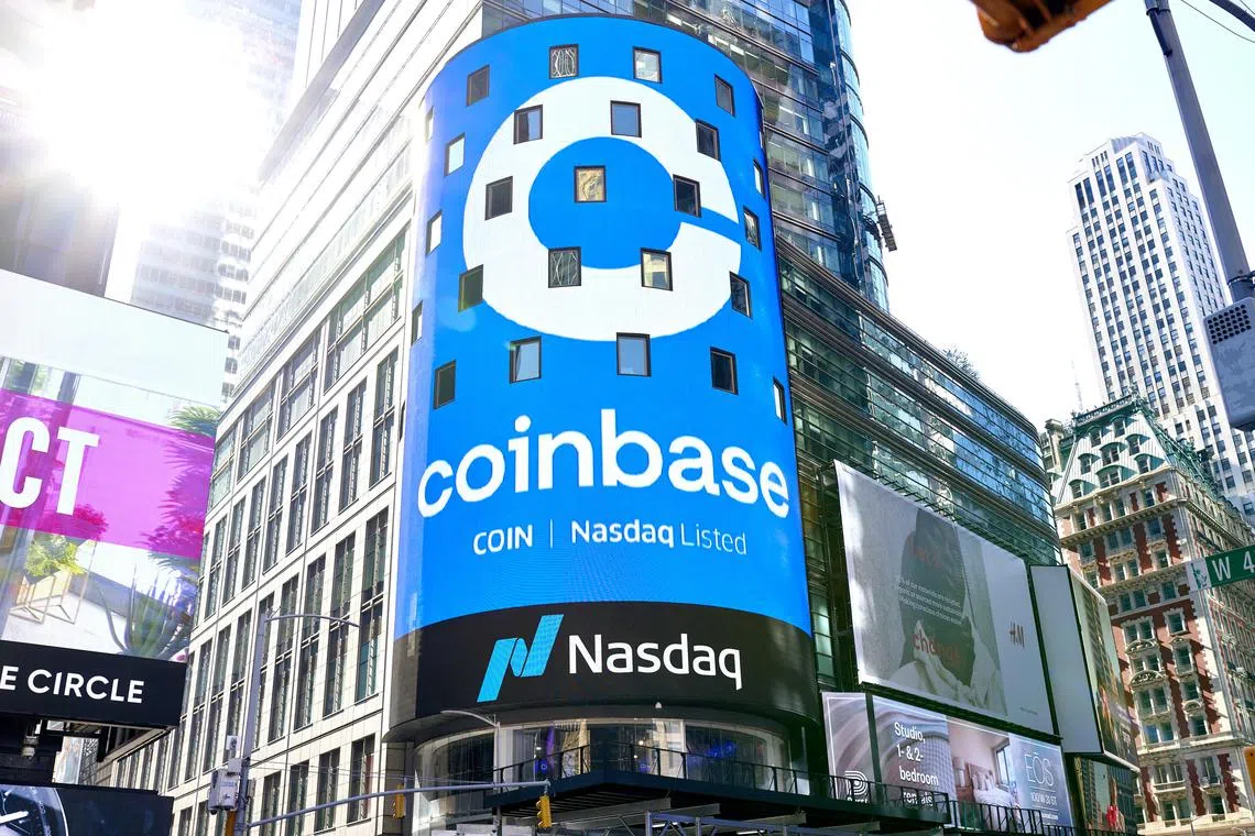 FILE Ñ The Coinbase logo is displayed on the billboard outside the Nasdaq Stock Market in Times Square in Manhattan on April 14, 2021. The Securities and Exchange Commission sued Coinbase, the largest cryptocurrency trading platform in the United States, on Tuesday, June 6, 2023, claiming that the company broke securities law by not registering as a broker. (Gabby Jones/The New York Times)