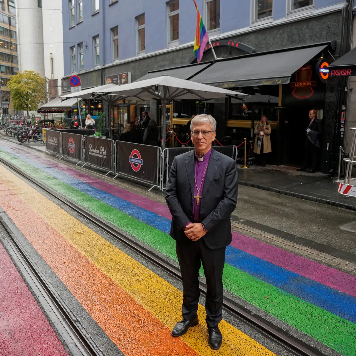 Olav Fykse Tveit, the leading bishop of the Church of Norway, stands in Rainbow Street outside the London pub, before giving a speech in which he expresses an apology to queers on behalf of the church, in Oslo, Norway, October 16, 2025. NTB/Javad Parsa/via REUTERS