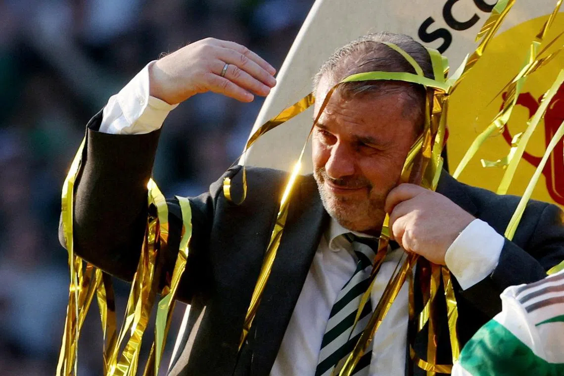 Celtic manager Ange Postecoglou celebrates after winning the Scottish Cup, their third domestic title in their recently concluded season.