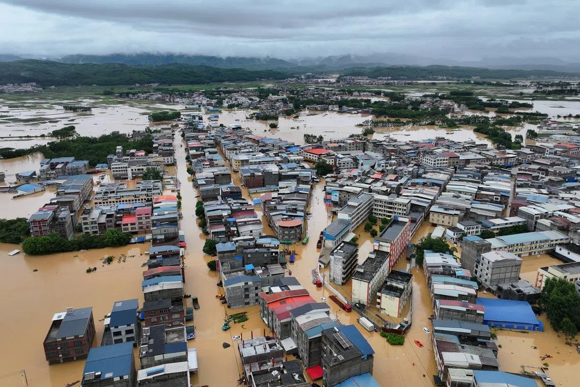 Flooding in Pingshan village, in Nanning’s Hengzhou, after heavy rainfall brought by Typhoon Maysak on July 6.