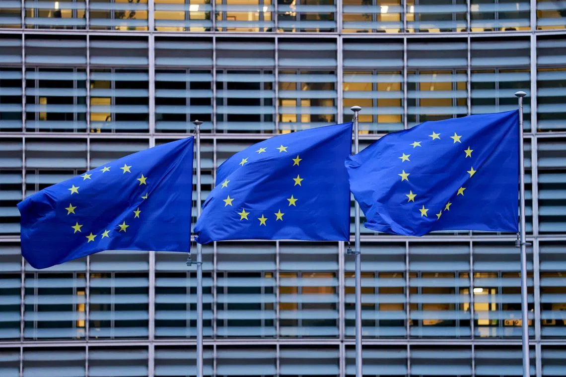 European Union flags flutter outside the EU Commission headquarters, on the day of a European Union leaders' summit in Brussels, Belgium, December 18, 2025. REUTERS/Stephanie Lecocq
