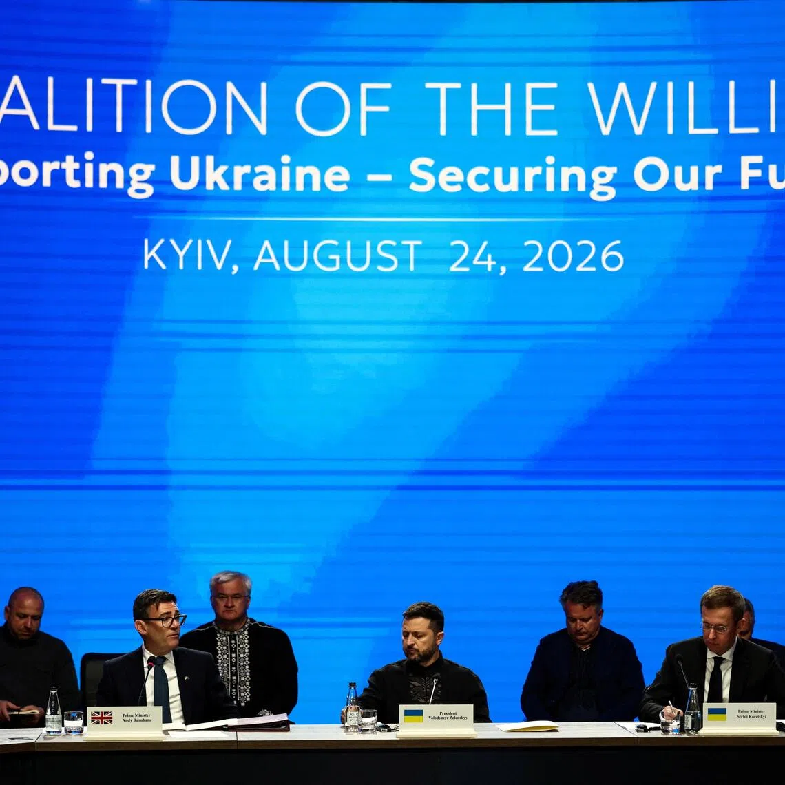 British Prime Minister Andy Burnham (centre left) and Ukrainian President Volodymyr Zelensky (centre) at a meeting of the Coalition of the Willing, in Kyiv, Ukraine, on Aug 24.