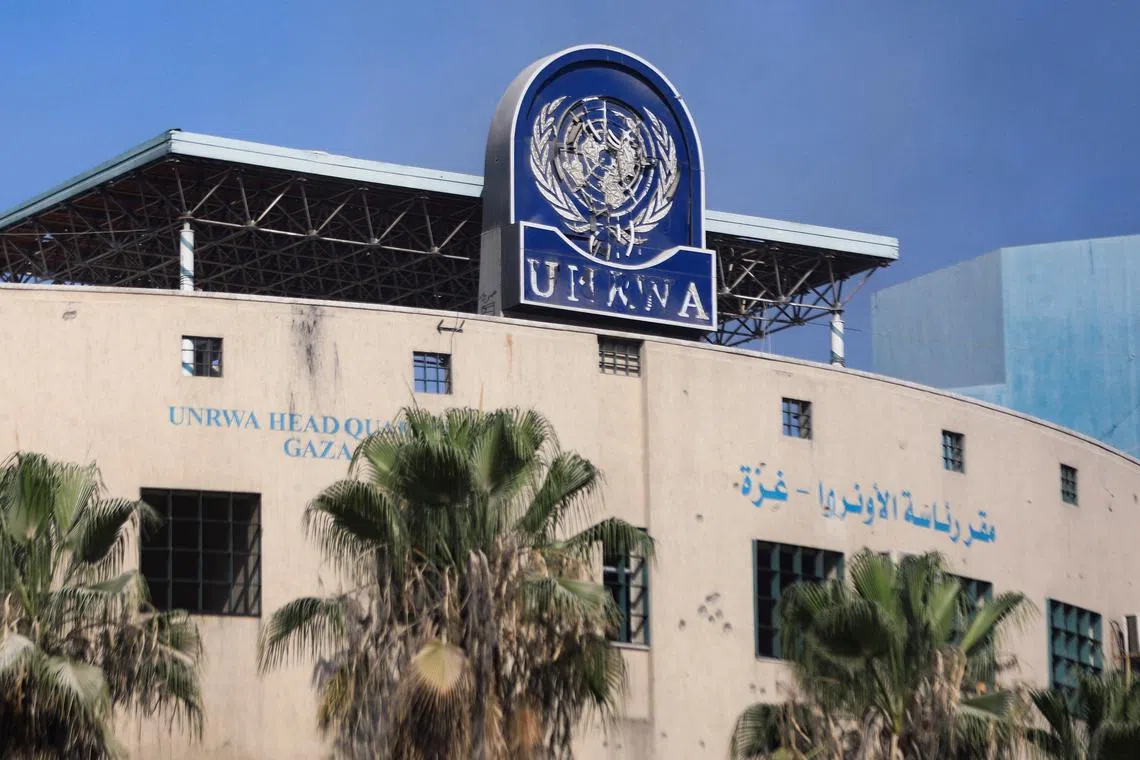FILE PHOTO: A damaged sign is pictured at the headquarters of UNRWA, following an Israeli raid, amid the Israel-Hamas conflict, in Gaza City, July 12, 2024. REUTERS/Dawoud Abu Alkas/File Photo