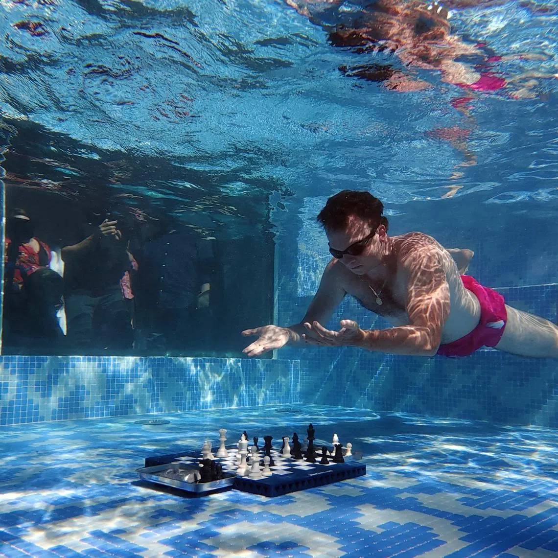FILE PHOTO: Chess - Grand Masters compete in Diving Chess Competition - Silo Hotel, Cape Town, South Africa - December 4, 2025 Hans Niemann of the U.S. in action REUTERS/Esa Alexander/File Photo