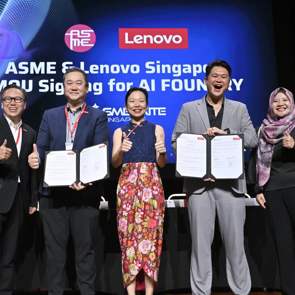 Minister of State for Digital Development and Information Jasmin Lau witnessing the signing of the MOU between ASME and Lenovo on Jan 22.