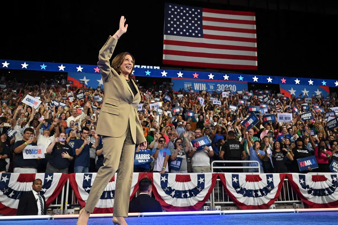 US Vice President and Democratic presidential candidate Kamala Harris arrives on stage for a campaign event at Desert Diamond Arena in Glendale, Arizona, on August 9, 2024. (Photo by Robyn Beck / AFP)