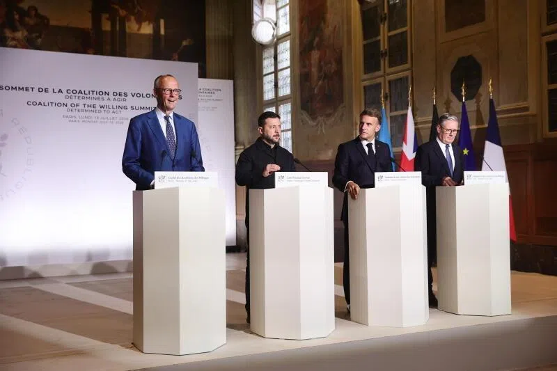 (From left) German Chancellor Friedrich Merz, Ukrainian President Volodymyr Zelensky, French President Emmanuel Macron, and British Prime Minister Keir Starmer at a press conference after the Coalition of the Willing summit on security guarantees for Ukraine in Paris, France.