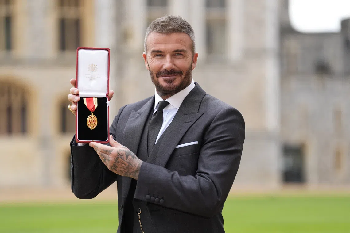 Sir David Beckham, after he was made a Knight Bachelor at an investiture ceremony at Windsor Castle, Berkshire. November 4, 2025. Andrew Matthews/Pool via REUTERS
