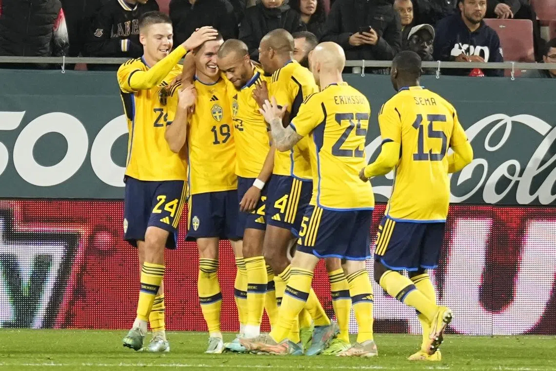 Sweden's Mattias Svanberg (second from left) celebrates with teammates after scoring the winner against Mexico in their friendly on Thursday.