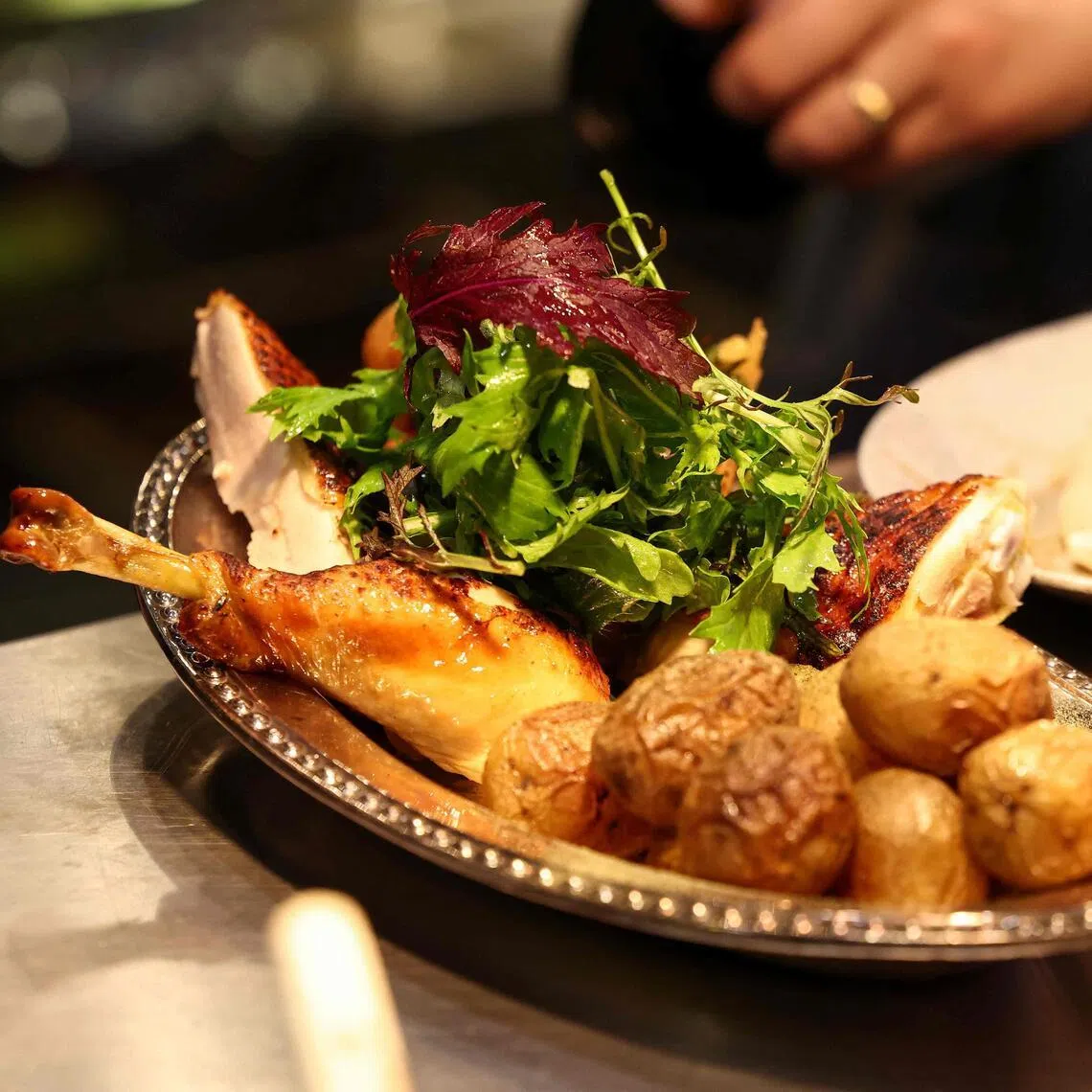 A US$40 rotisserie chicken sold at Mr Hugo Hivernat's French restaurant, Gigi's, is highlighting how dining out has become prohibitively expensive in one of the world’s culinary capitals.