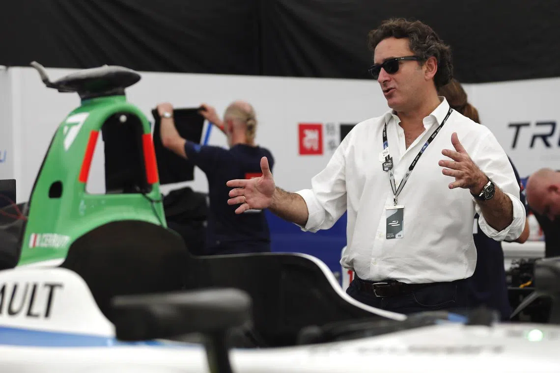 FILE PHOTO: Alejandro Agag, Formula E CEO, gestures next to Michela Cerruti's Formula E car in the box during an interview with Reuters ahead of round four of the Formula E championship in Buenos Aires, January 8, 2015.   REUTERS/Marcos Brindicci/ File Photo