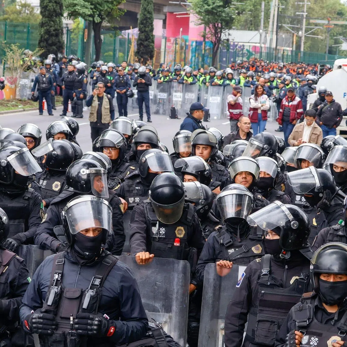 Police block the way to the Ciudad de Mexico Stadium during a protest in Mexico City on June 9.
