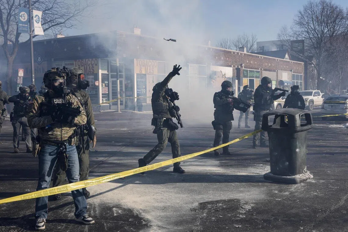 Federal agents during scuffles at the scene of a shooting involving federal immigration agents in Minneapolis, Minnesota, on Jan 24.