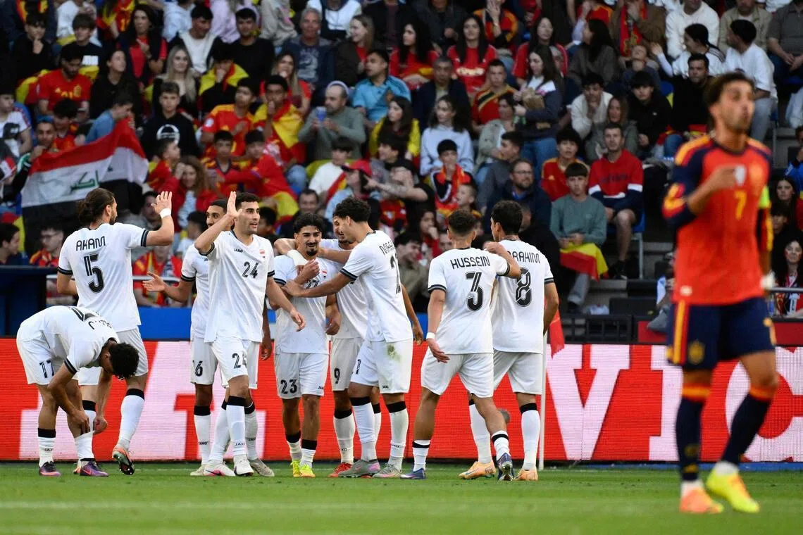 Iraq defender Merchas Doski celebrates scoring the equaliser on June 4 against a Spain side that was lacking several key players.