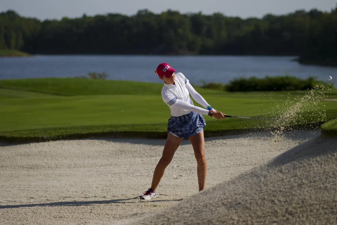 FILE PHOTO: Sep 14, 2024; Gainesville, Virginia, USA; Nelly Korda of Team USA plays a shot from a bunker on the 12th hole during Foursomes matches against Team Europe during the second round of the Solheim Cup 2024 at Robert Trent Jones Golf Club. Mandatory Credit: Aaron Doster-Imagn Images/File Photo