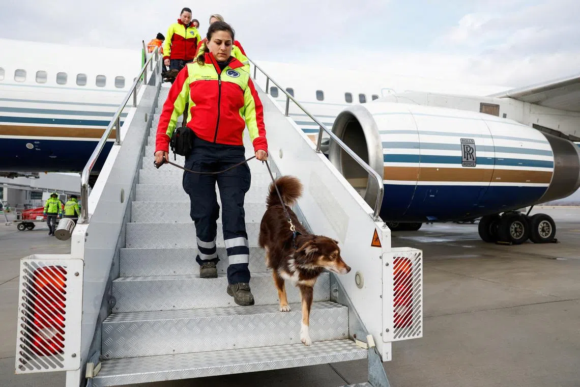 Rescuers of International Search and Rescue (ISAR) Germany arrive to help at Gaziantep Airport, Turkey, on Feb 7.