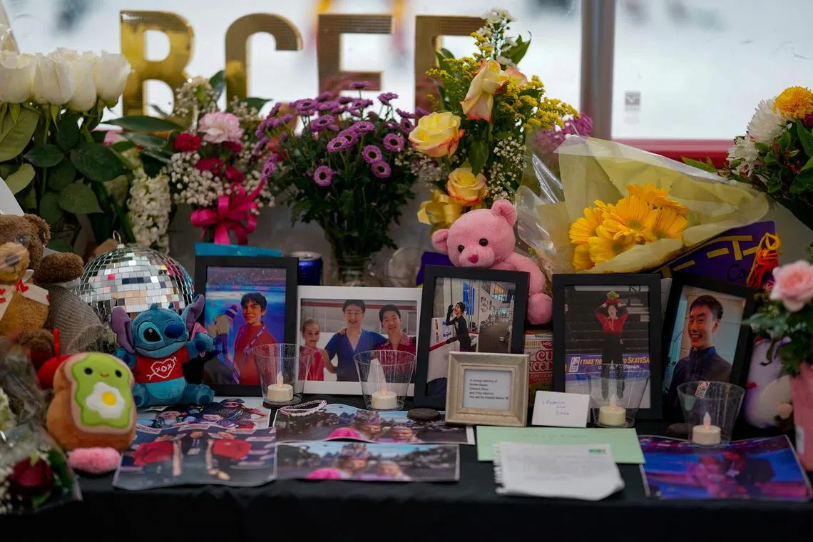 A memorial honoring figure skaters who were among the passengers killed in the collision of American Eagle flight 5342 and a U.S. Army Black Hawk helicopter near Ronald Reagan National Airport, stands at the MedStar Capitals Iceplex in Arlington, Virginia, U.S. February 2, 2025. REUTERS/Kent Nishimura