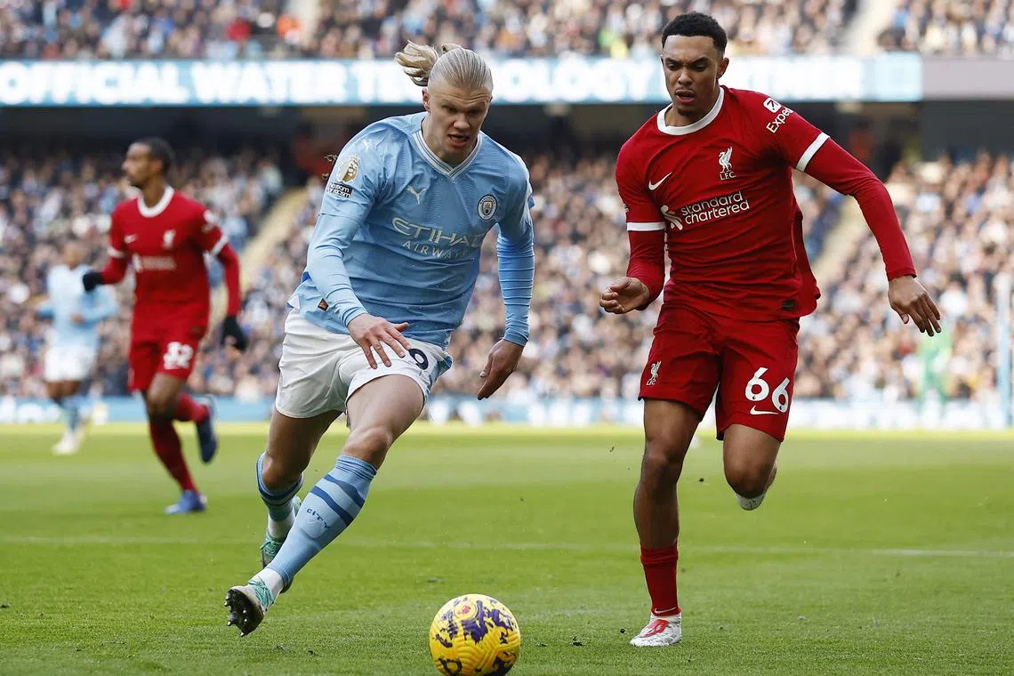 Manchester City's Erling Haaland battling for the ball with Liverpool's Trent Alexander-Arnold. Both players were on the scoresheet in the 1-1 Premier League draw.