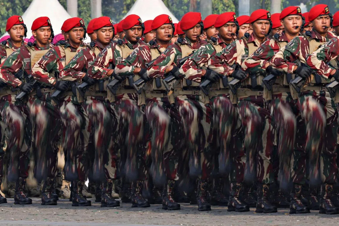 FILE PHOTO: Indonesian Military Special Forces personnel march during the 79th Indonesian Military Anniversary celebrations at the National Monument (Monas) complex in Jakarta, Indonesia, October 5, 2024. REUTERS/Ajeng Dinar Ulfiana/File Photo