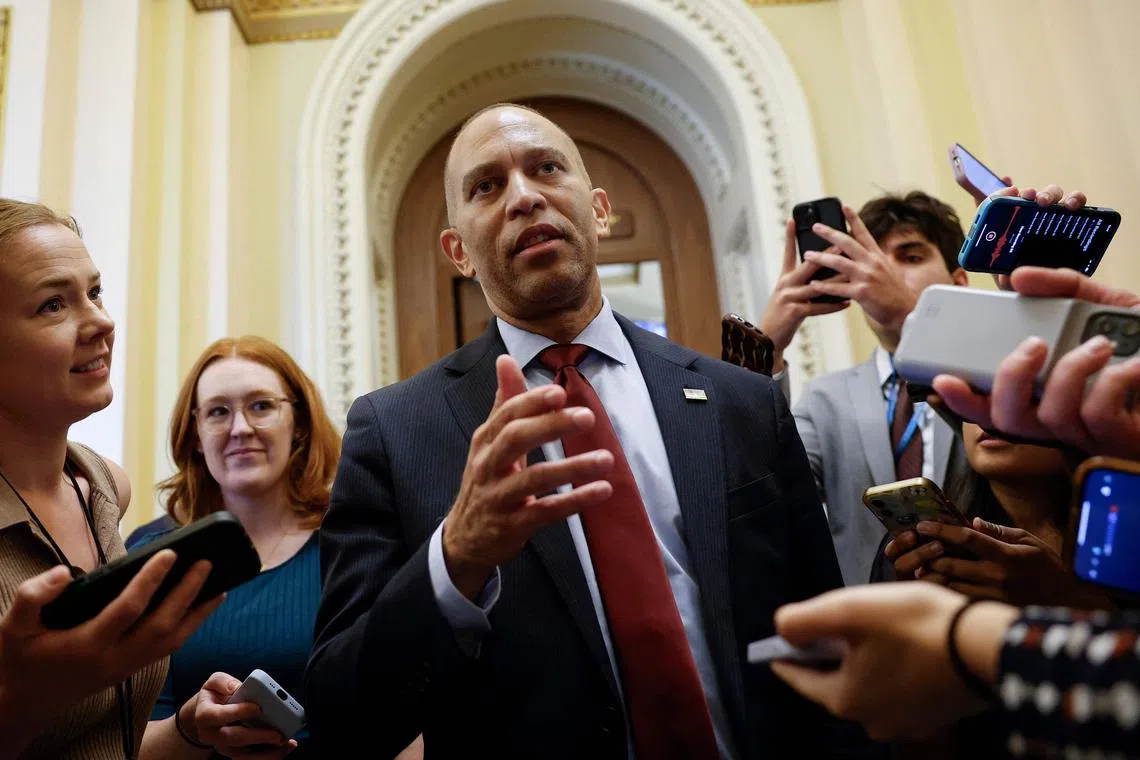 US. House Minority Leader Hakeem Jeffries  speaking to reporters as he walks off the House floor after speaking for 8 hours and 46 minutes on July 3.