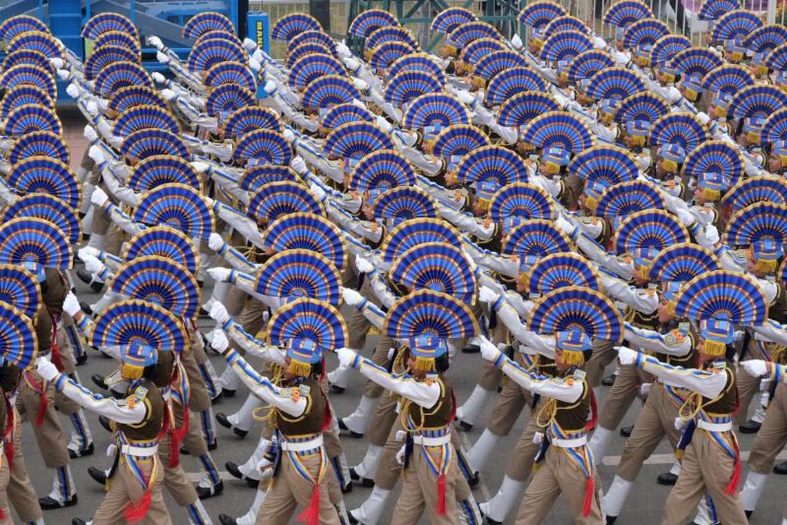 The Central Reserve Police Force (CRPF) contingent march through the ceremonial Kartavya Path during the Republic Day parade in New Delhi, India, on Thursday, Jan. 26, 2023. PHOTO : BLOOMBERG