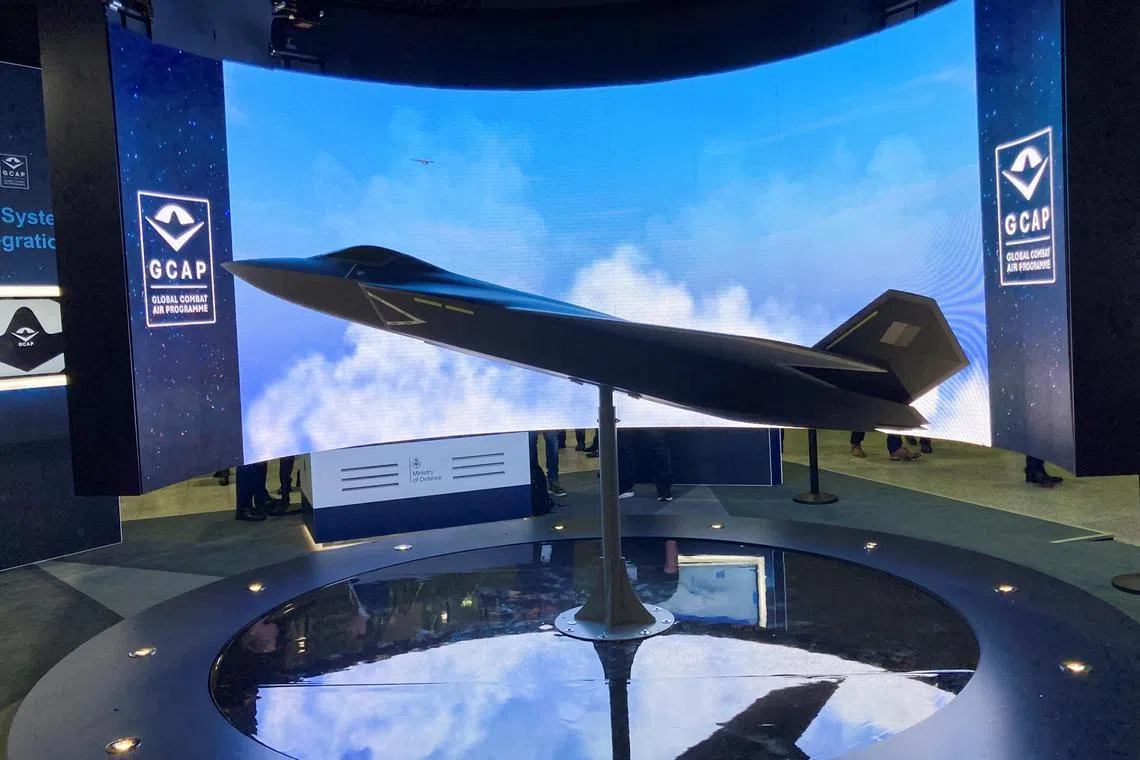 A model of a new fighter jet of the Global Combat Air Programme, led by Britain, Japan, and Italy, is seen at the DSEI defence event in London.