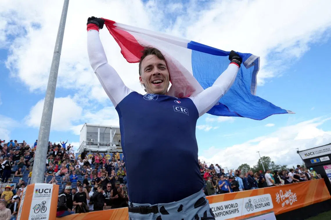 FILE PHOTO: Cycling - UCI World Championships 2023 - Glasgow BMX Centre, Glasgow, Scotland, Britain - August 13, 2023 France's Romain Mahieu celebrates after winning the BMX Racing men's elite final REUTERS/Maja Smiejkowska/File Photo