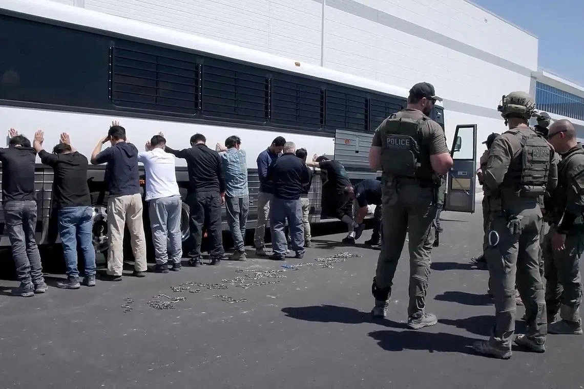 Detainees during the Sept 4 raid by US federal agents at the Hyundai Motor-LG battery plant in Georgia.