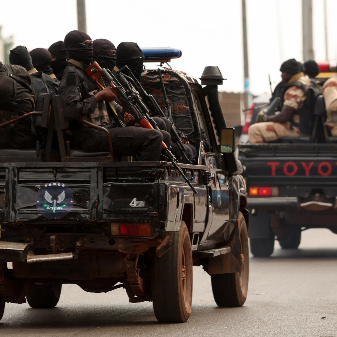 Soldiers patrol on the main road in Bissau, Guinea-Bissau, November 21, 2025. REUTERS/Luc Gnago