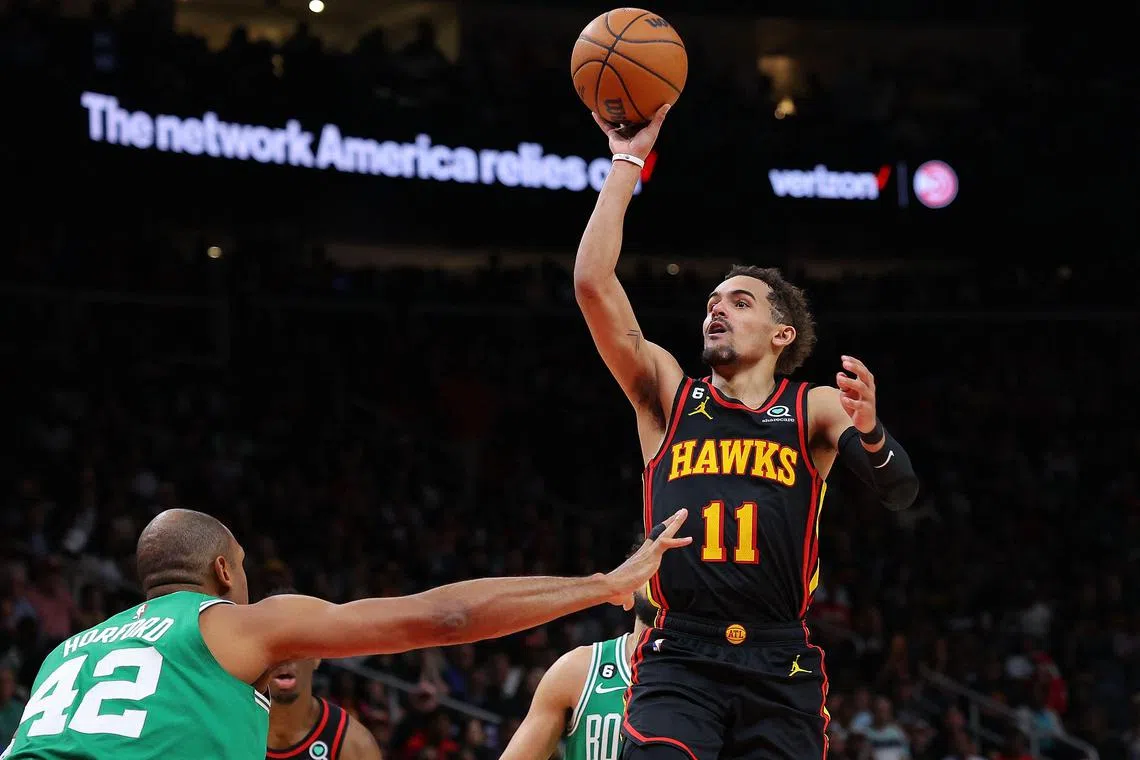 Trae Young of the Atlanta Hawks attempts a shot against Al Horford of the Boston Celtics during the fourth quarter of Game 3 of their NBA play-offs.