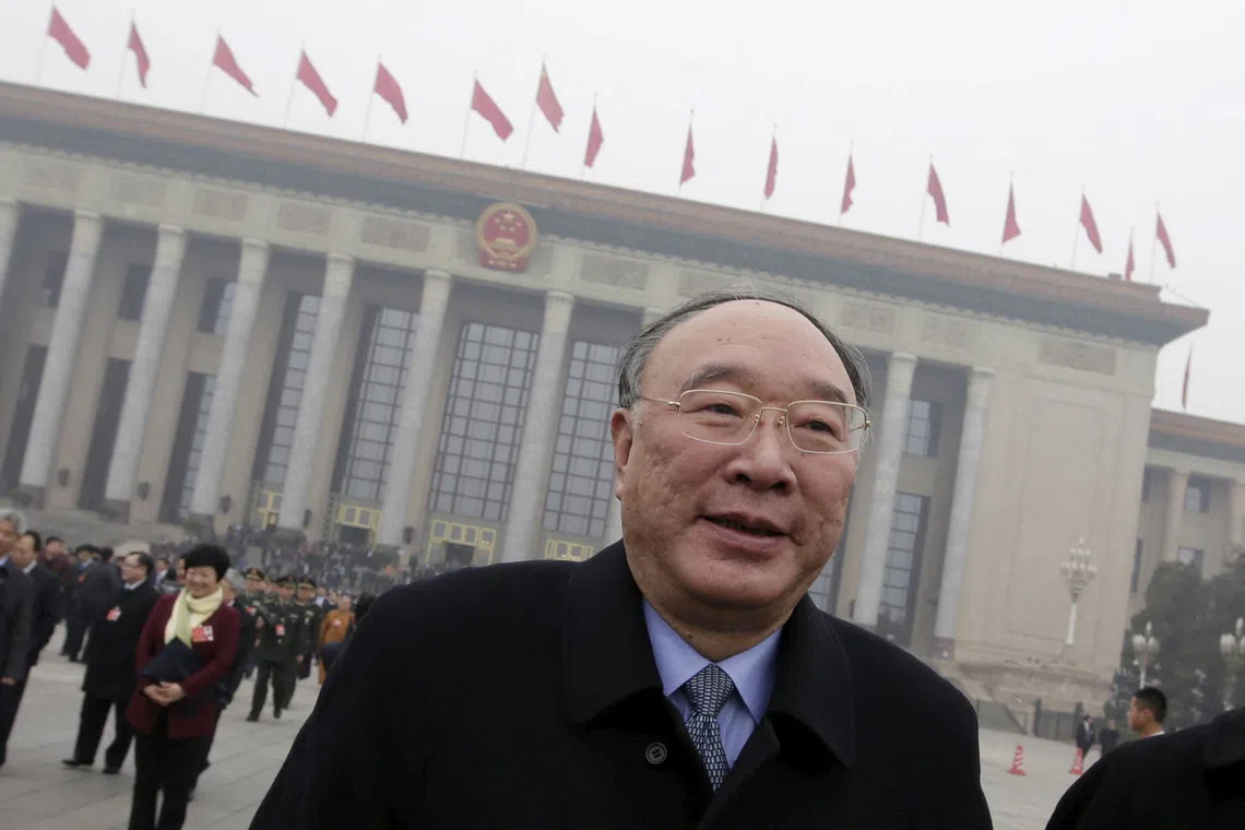 Chongqing mayor Huang Qifan leaves the Great Hall of the People after a plenary meeting of the National People’s Congress, China’s parliament, in Beijing, China, on March 4, 2016.